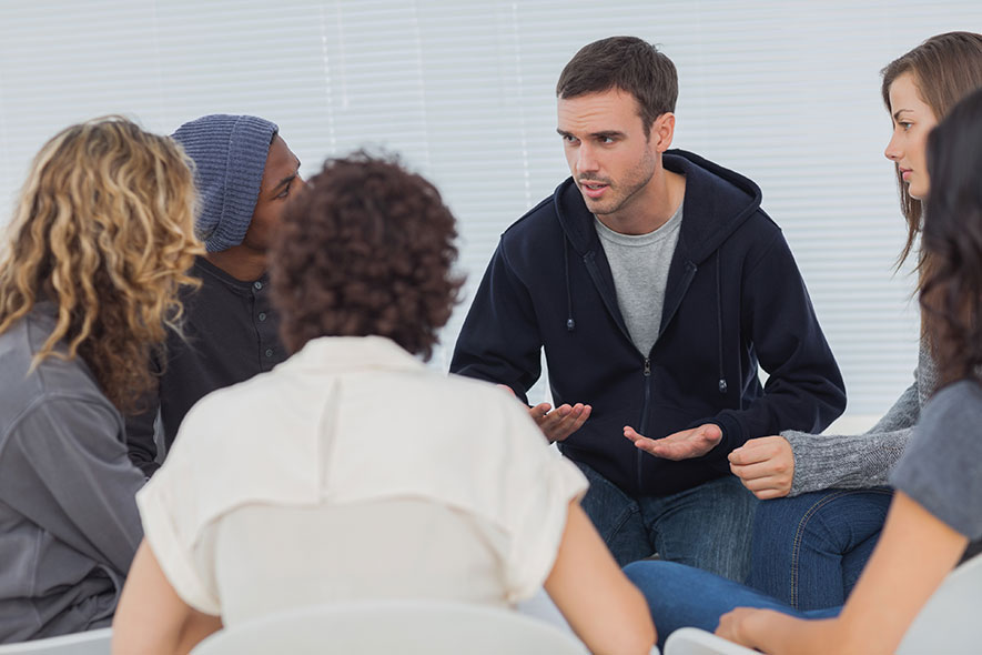 circle of people at support group